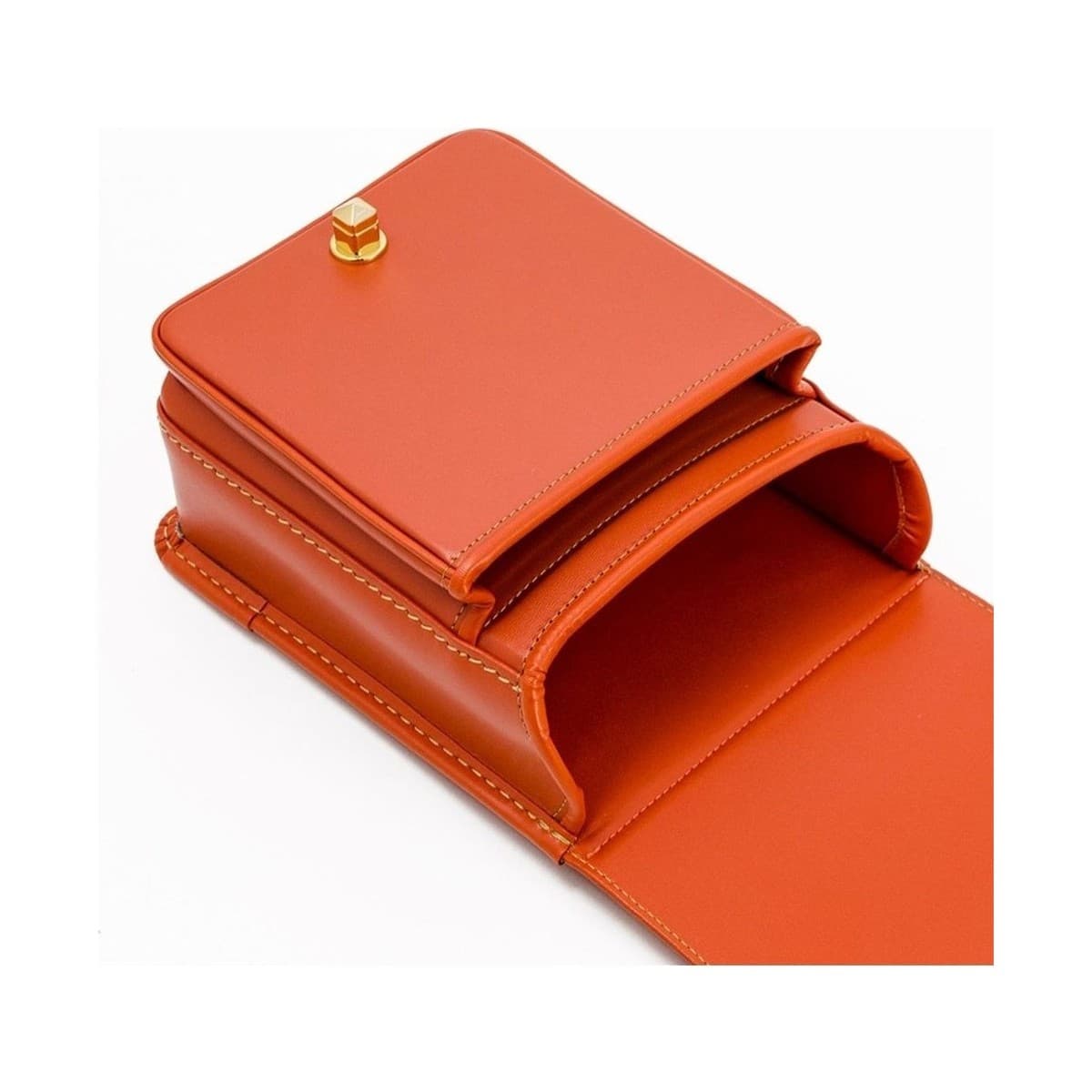 Tangerine Mini Ransel — open lid revealing interior.